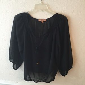 Sheer black blouse